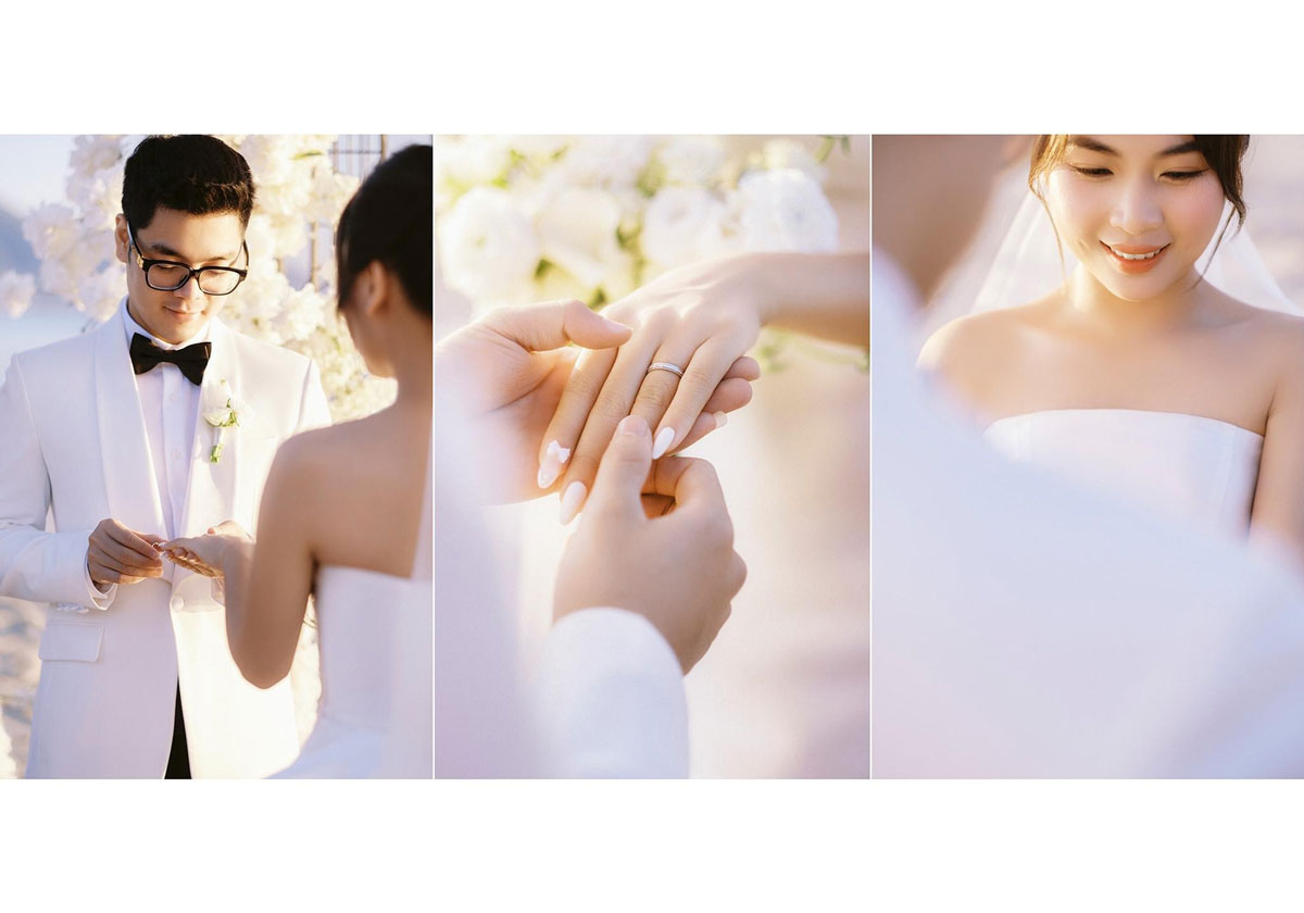 Groom placing the ring on the bride's finger during the ceremony Groom placing the ring on the bride's finger during the ceremony